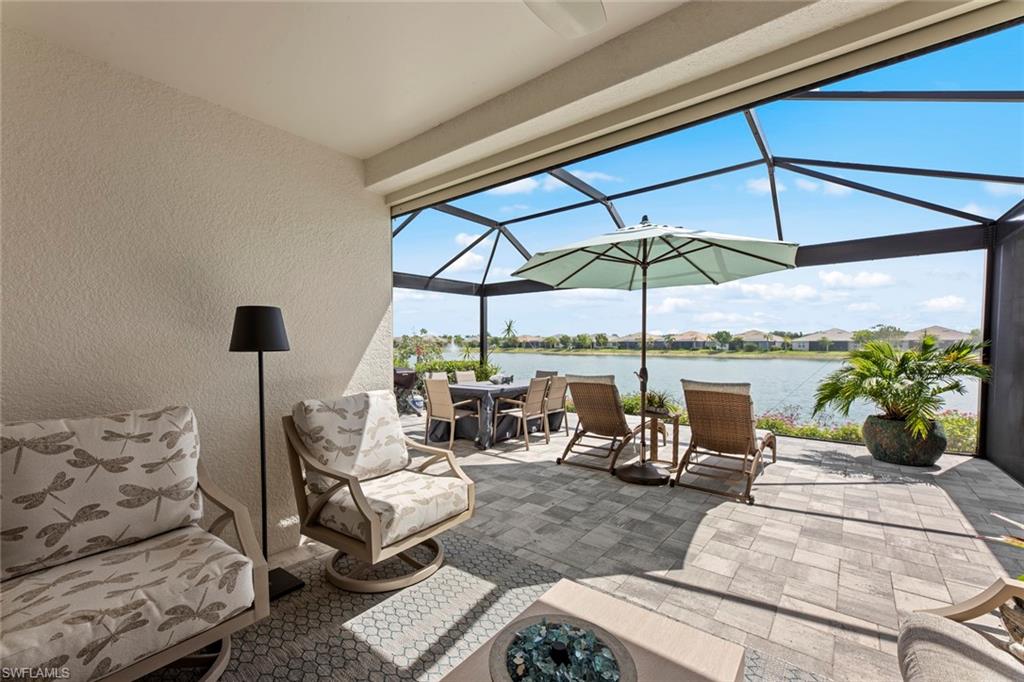 14904 Edgewater Circle Naples, FL 34114 - Photo 29 of 50 a living room with furniture and white walls