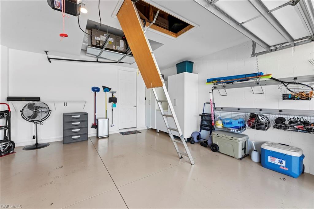 14904 Edgewater Circle Naples, FL 34114 - Photo 32 of 50 a view of a room with gym equipment