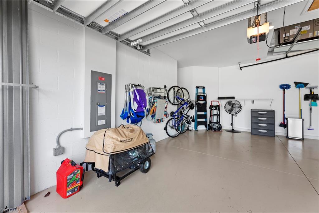 14904 Edgewater Circle Naples, FL 34114 - Photo 33 of 50 a view of a room with gym equipment