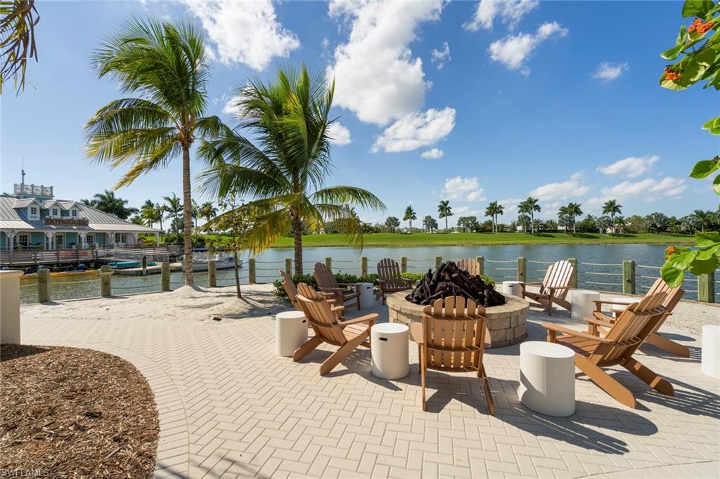 14904 Edgewater Circle Naples, FL 34114 - Photo 45 of 50 a view of a swimming pool and lounge chairs