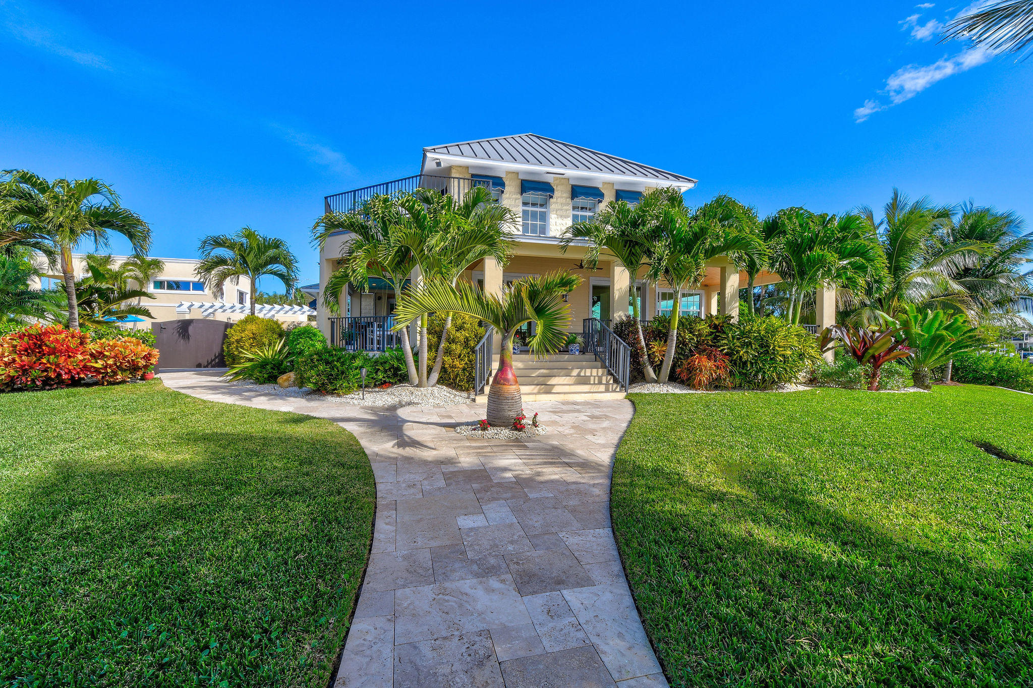 4980 County Line Road Tequesta, FL 33469 - Photo 37 of 56 Redesigned walk way from Dock to Veranda