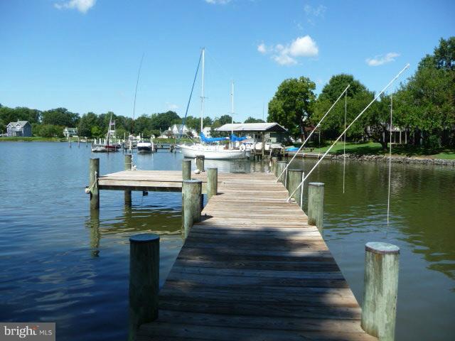 1201 Daves Road Edgewater, MD 21037 - Photo 4 of 30 a view of a lake with boats in front of it