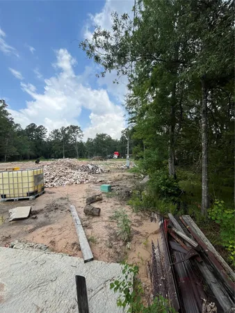 a view of a park with swings and slides
