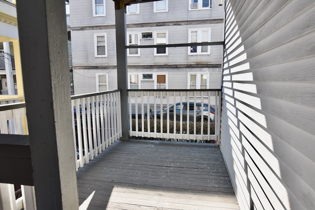 21 Treadway Road, Unit 2 Boston, MA 02125 - Photo 20 of 21 a balcony view with a floor to ceiling window
