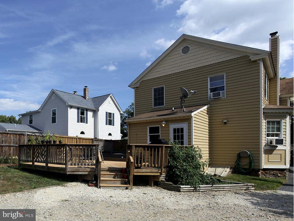6184 Old Washington Road Elkridge, MD 21075 - Photo 21 of 22 REAR DECK AND DRIVEWAY