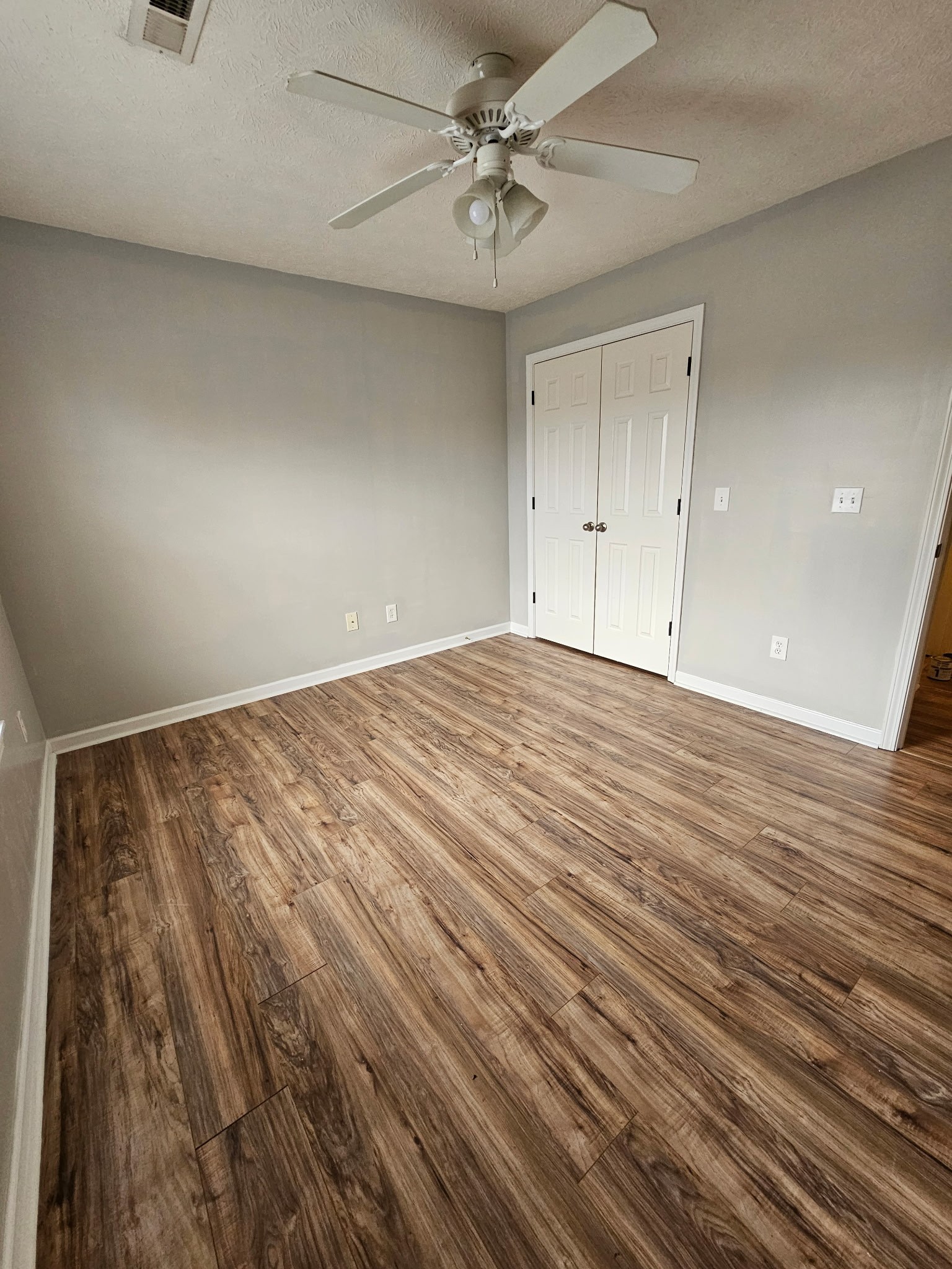 4311 Cap Davis Court Murfreesboro, TN 37129 - Photo 14 of 14 wooden floor in an empty room with a window