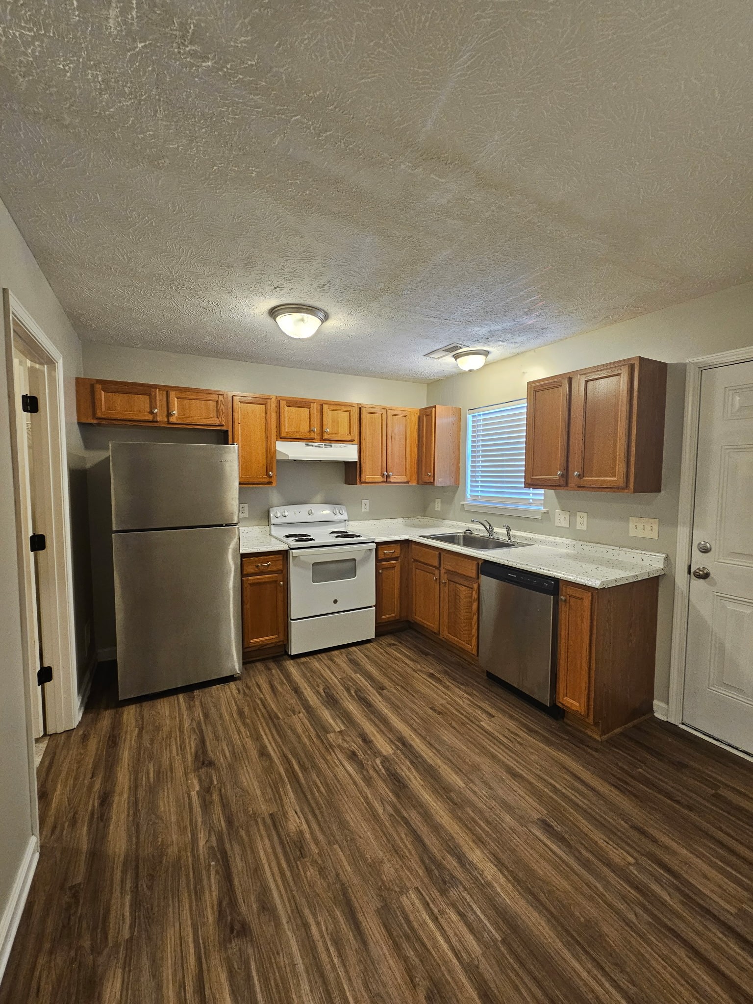 4311 Cap Davis Court Murfreesboro, TN 37129 - Photo 6 of 14 a kitchen with a refrigerator and cabinets