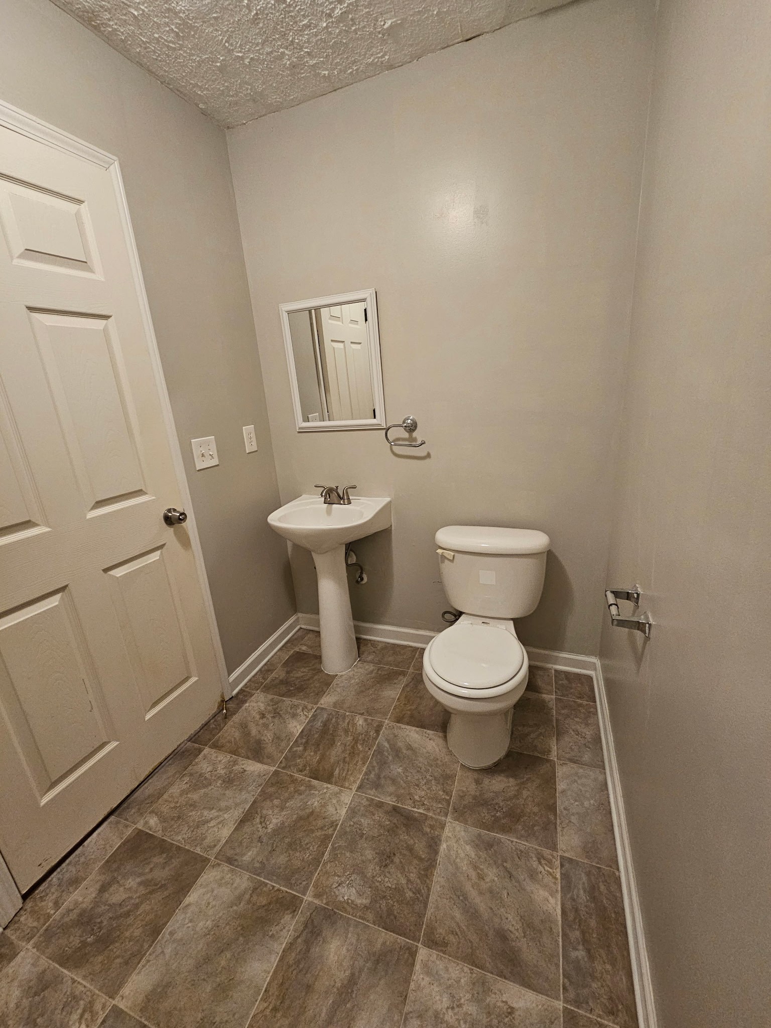 4311 Cap Davis Court Murfreesboro, TN 37129 - Photo 8 of 14 a bathroom with a toilet a sink and a mirror