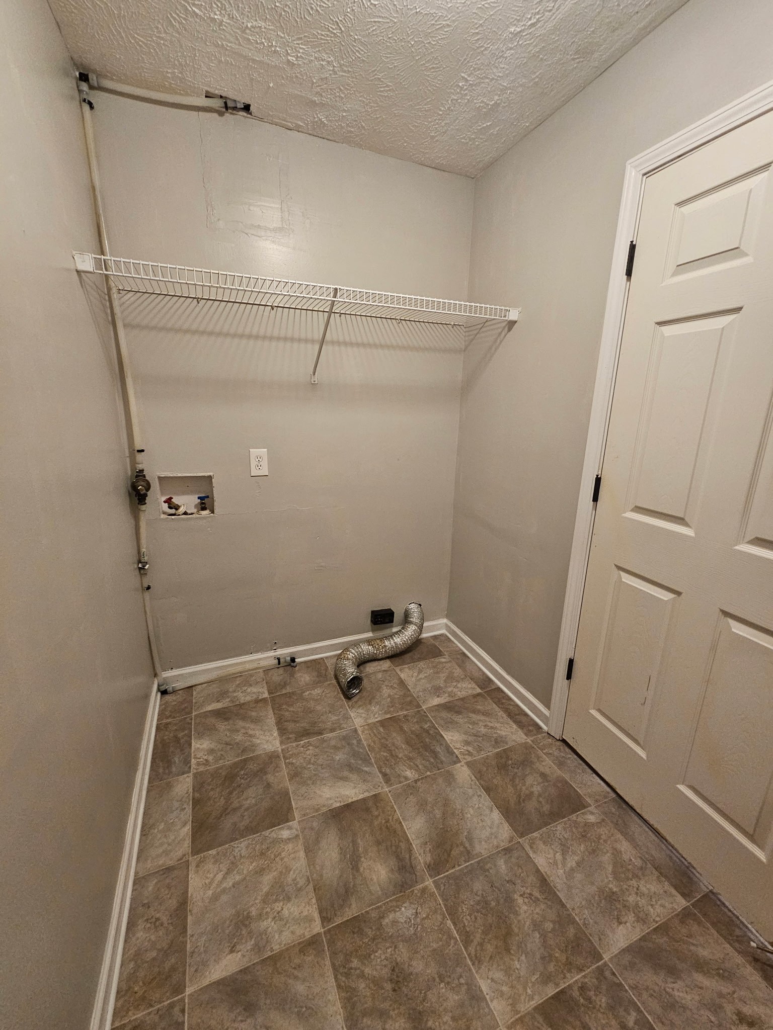 4311 Cap Davis Court Murfreesboro, TN 37129 - Photo 9 of 14 a view of a room with racks on the wall