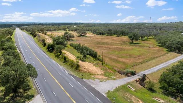 a bed room with a bed and a chandelier