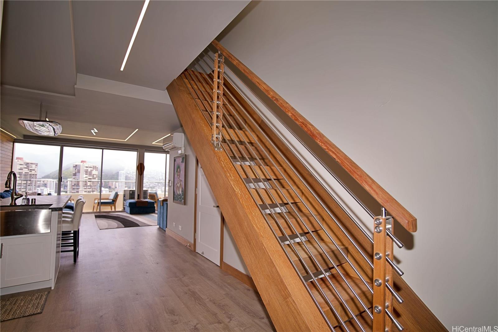 2211 Ala Wai Boulevard, Unit P6 Honolulu, HI 96815 - Photo 15 of 24 a view of entryway and hall with wooden floor