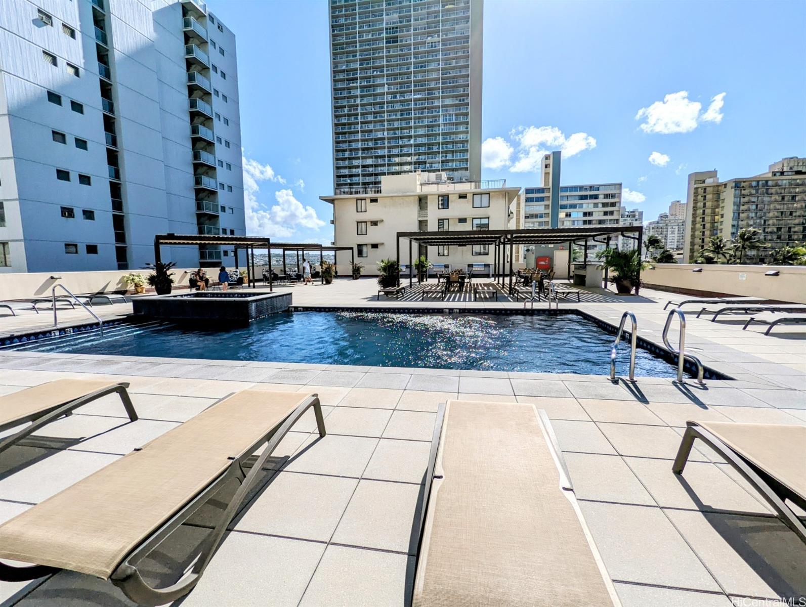 2211 Ala Wai Boulevard, Unit P6 Honolulu, HI 96815 - Photo 24 of 24 a view of a terrace with seating area