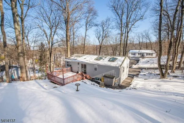 a view of a patio with a yard
