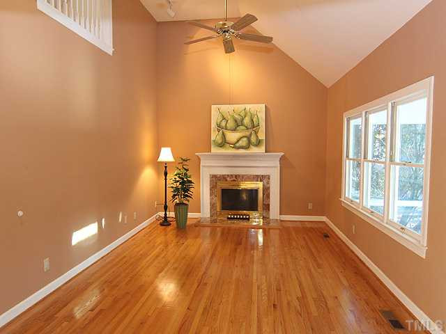 4311 Swarthmore Road Durham, NC 27707 - Photo 1 of 12 Vaulted ceiling, gas log fireplace, gleaming hardwood floors and access to lovely sunroom. Den/Family/Great Room