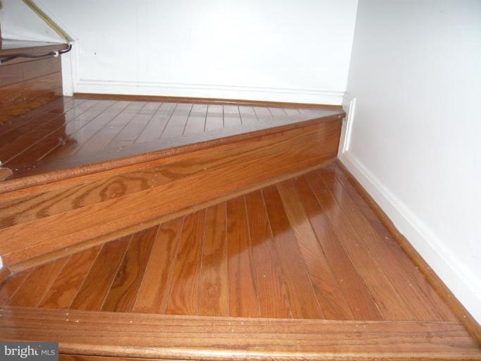12050 Edgemere Circle Reston, VA 20190 - Photo 8 of 18 Hardwood Stairs