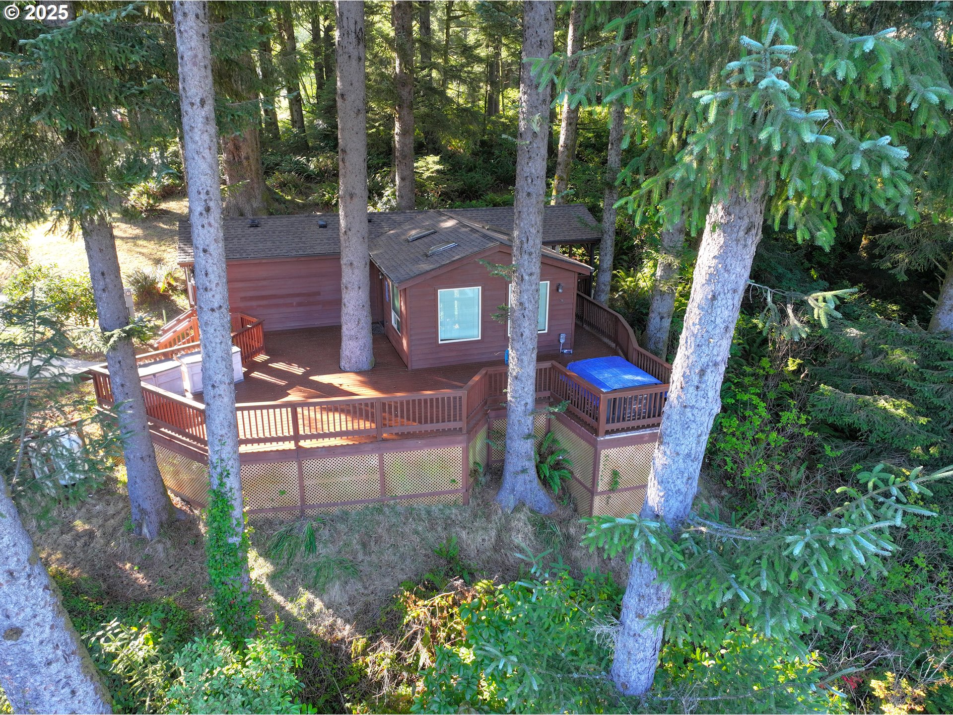 19921 Whaleshead Road, Unit EL1 Brookings, OR 97415 - Photo 19 of 29 front view of a house with a yard