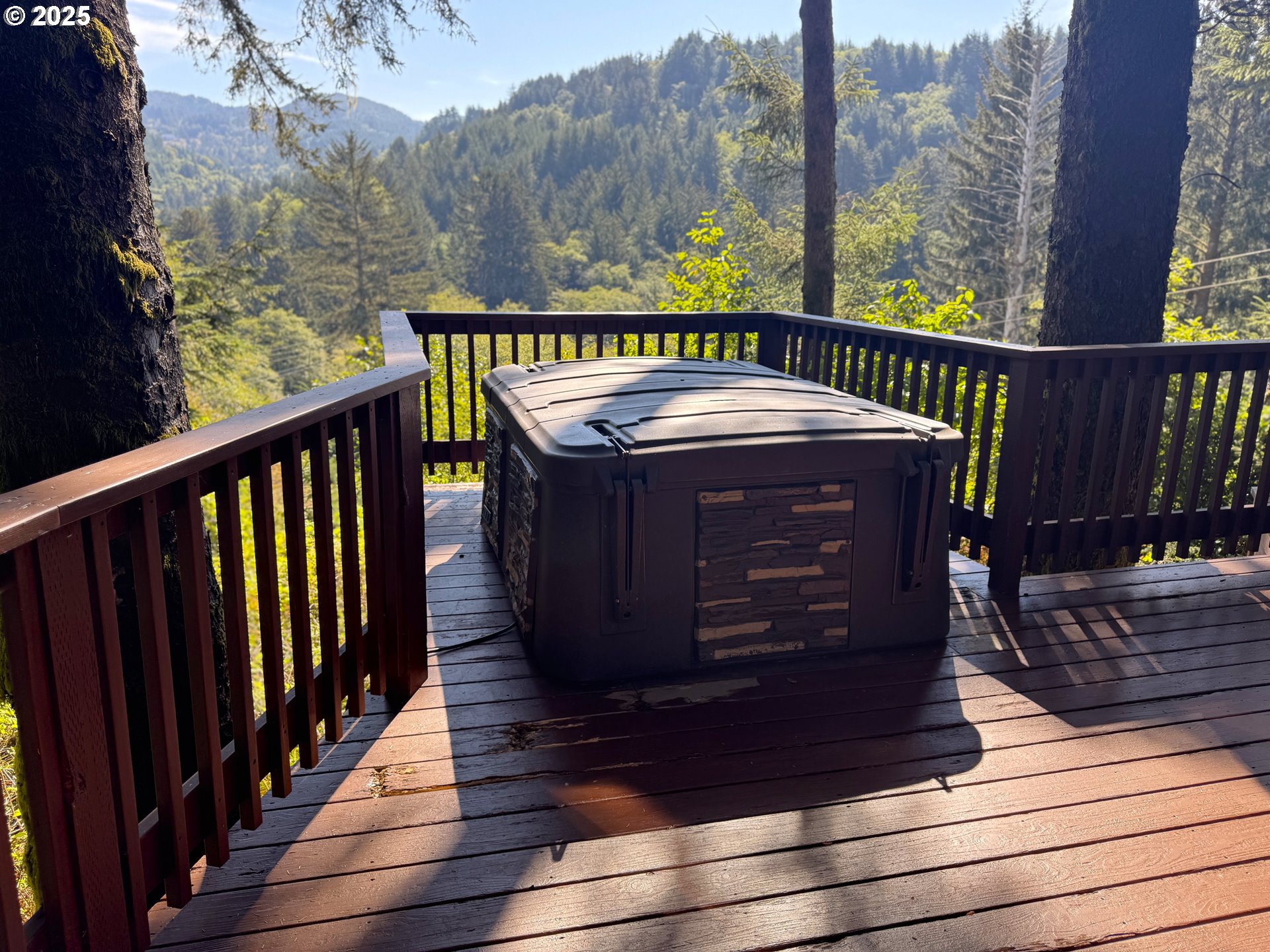 19921 Whaleshead Road, Unit EL1 Brookings, OR 97415 - Photo 21 of 29 a view of balcony with wooden floor