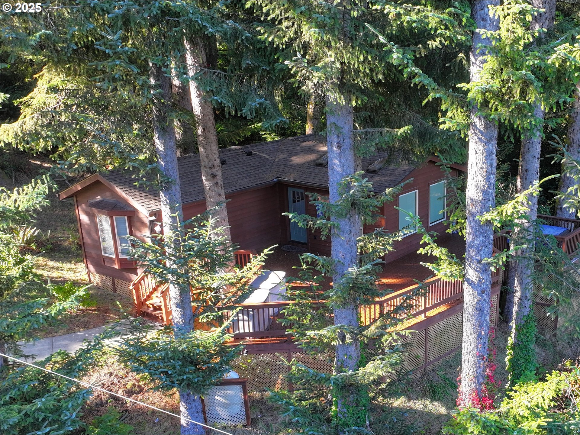 19921 Whaleshead Road, Unit EL1 Brookings, OR 97415 - Photo 28 of 29 a view of street along with house and trees