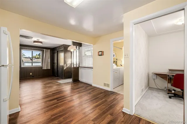 a view of livingroom with furniture and wooden floor