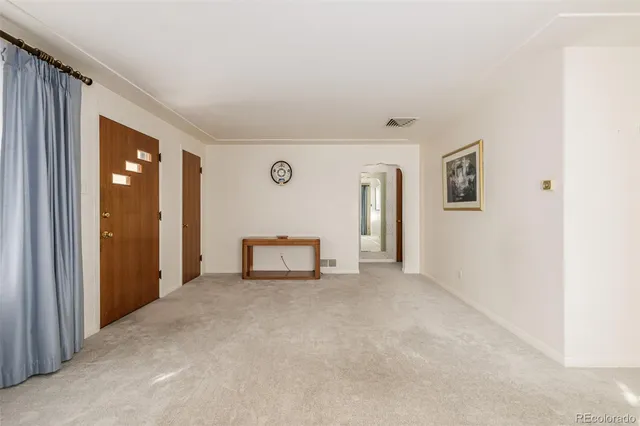 a view of empty room with windows