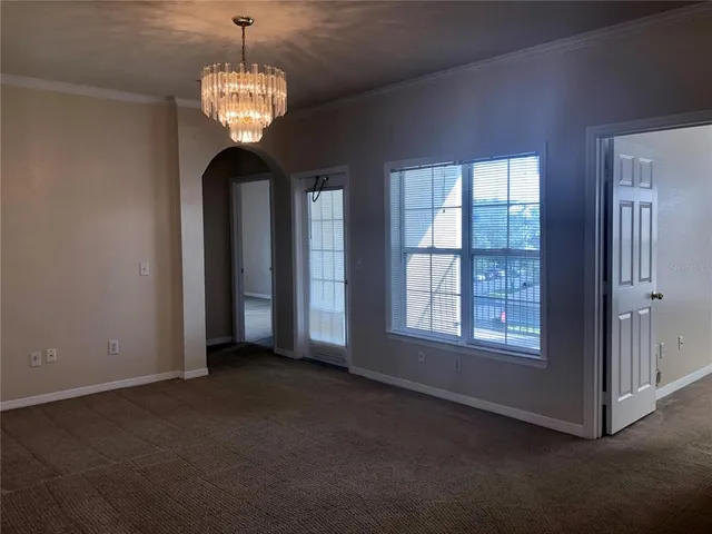 a bathroom with a granite countertop sink toilet and a mirror