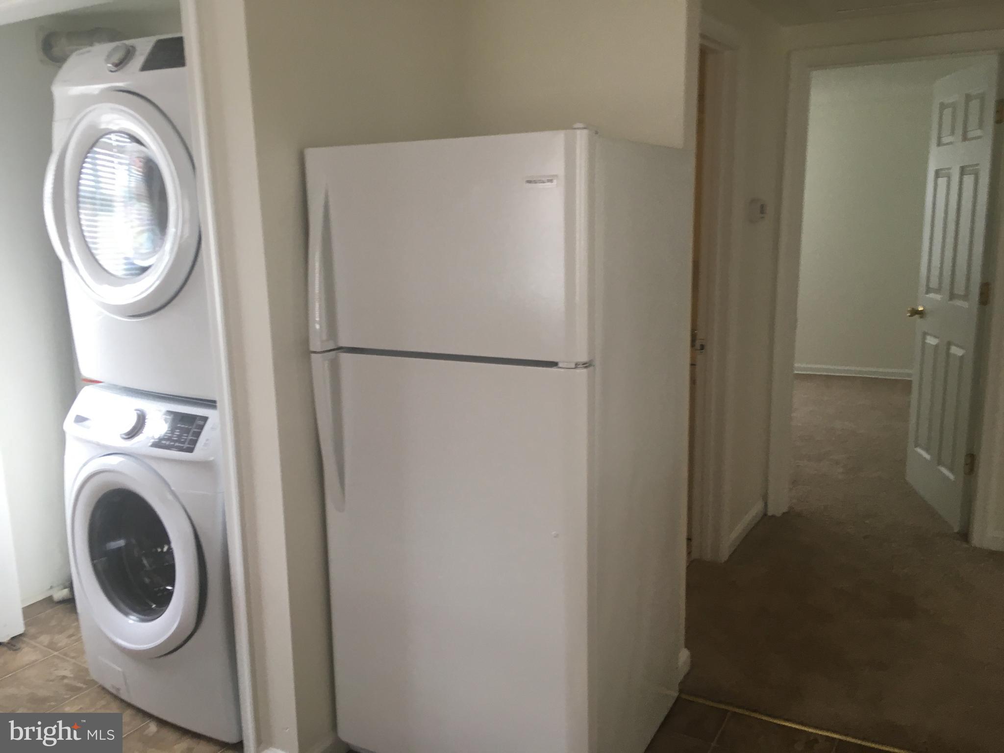 715 Rigby Avenue Cambridge, MD 21613 - Photo 9 of 21 Laundry and kitchen