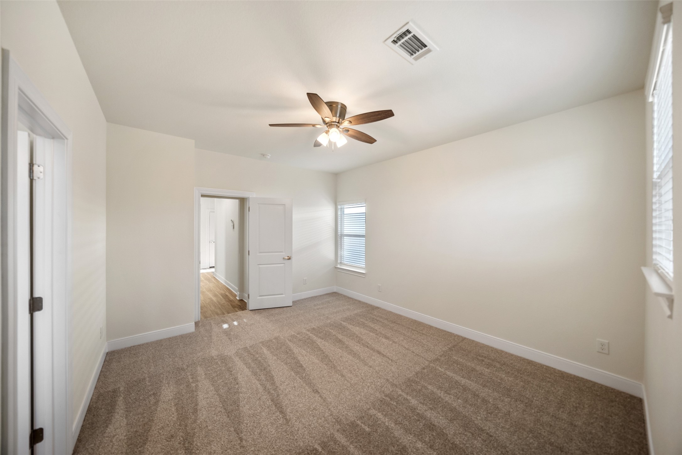 412 West Marlin Street Willis, TX 77378 - Photo 12 of 22 wooden floor in an empty room