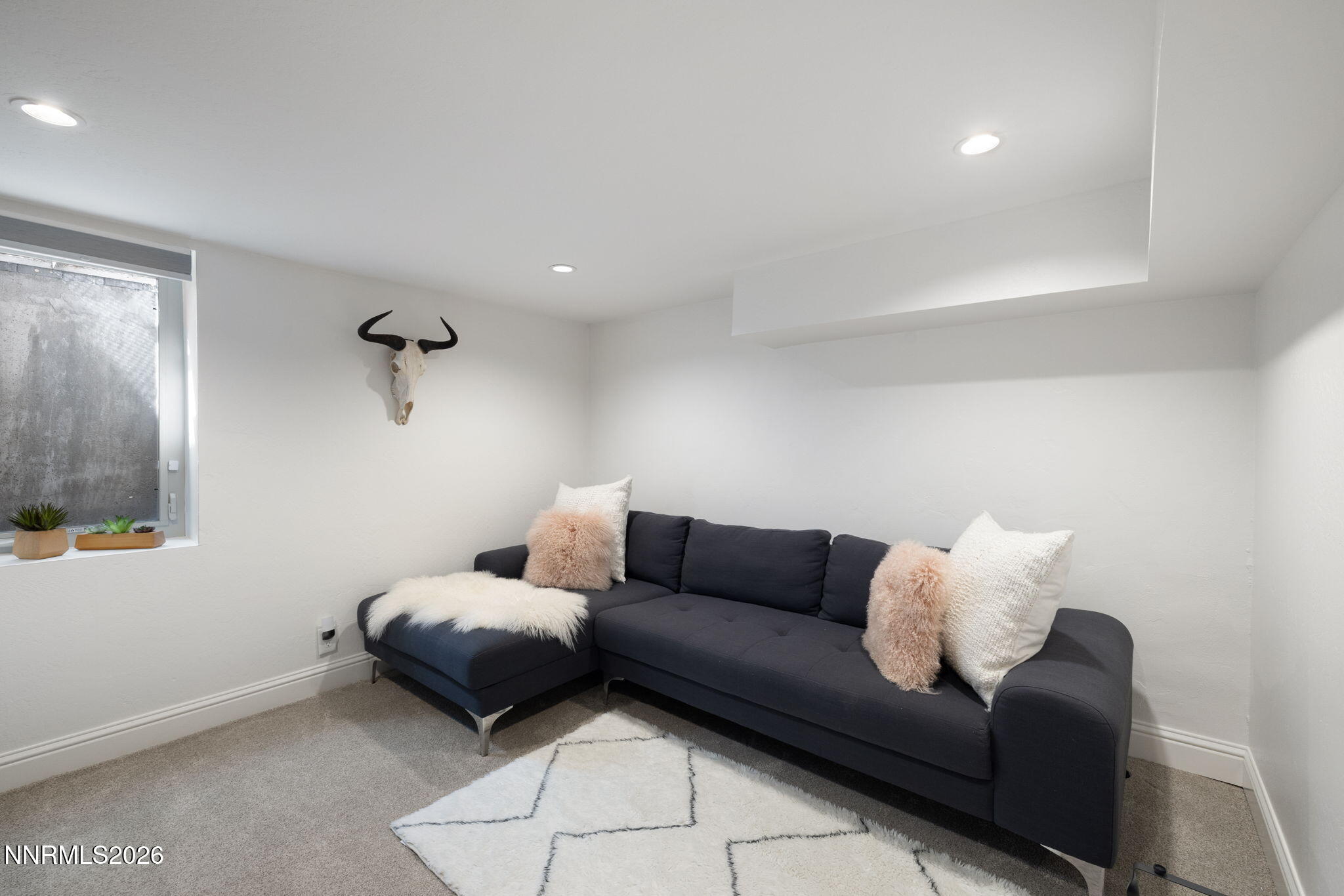 210 Bret Harte Avenue Reno, NV 89509 - Photo 29 of 40 a living room with furniture and a couch