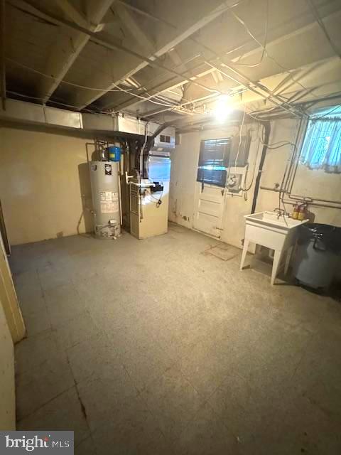 3582 Dudley Avenue Baltimore, MD 21213 - Photo 12 of 13 a view of a room with wooden floor