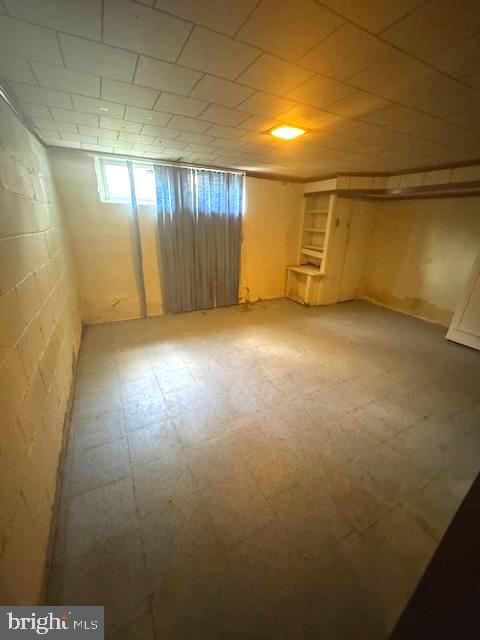 3582 Dudley Avenue Baltimore, MD 21213 - Photo 10 of 13 an empty room with a empty space and windows