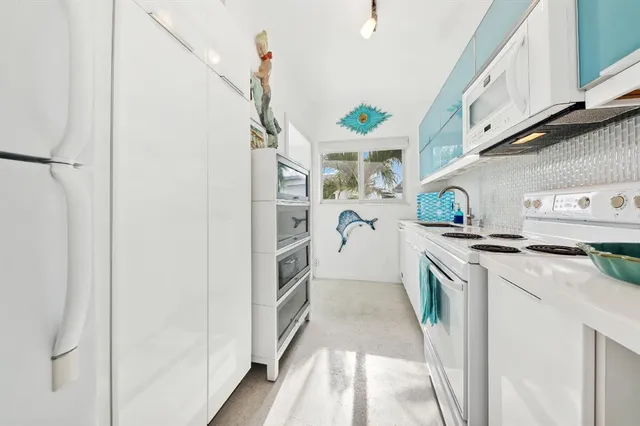 a bedroom with furniture and a flat screen tv