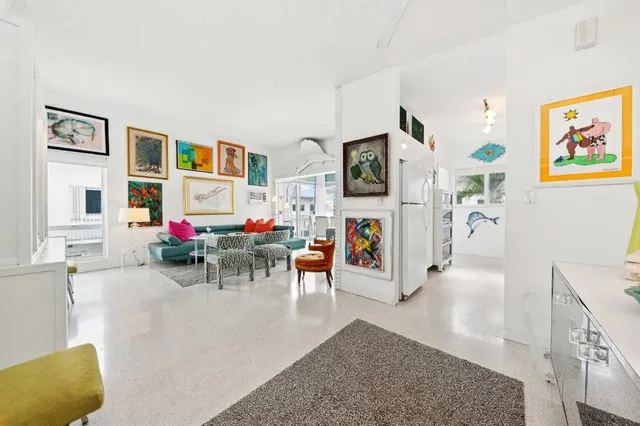 a kitchen with stainless steel appliances granite countertop a stove and a refrigerator