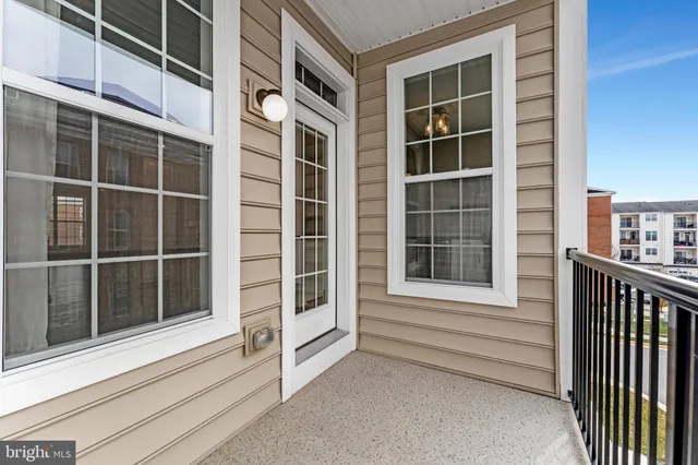 a front view of a building with many windows