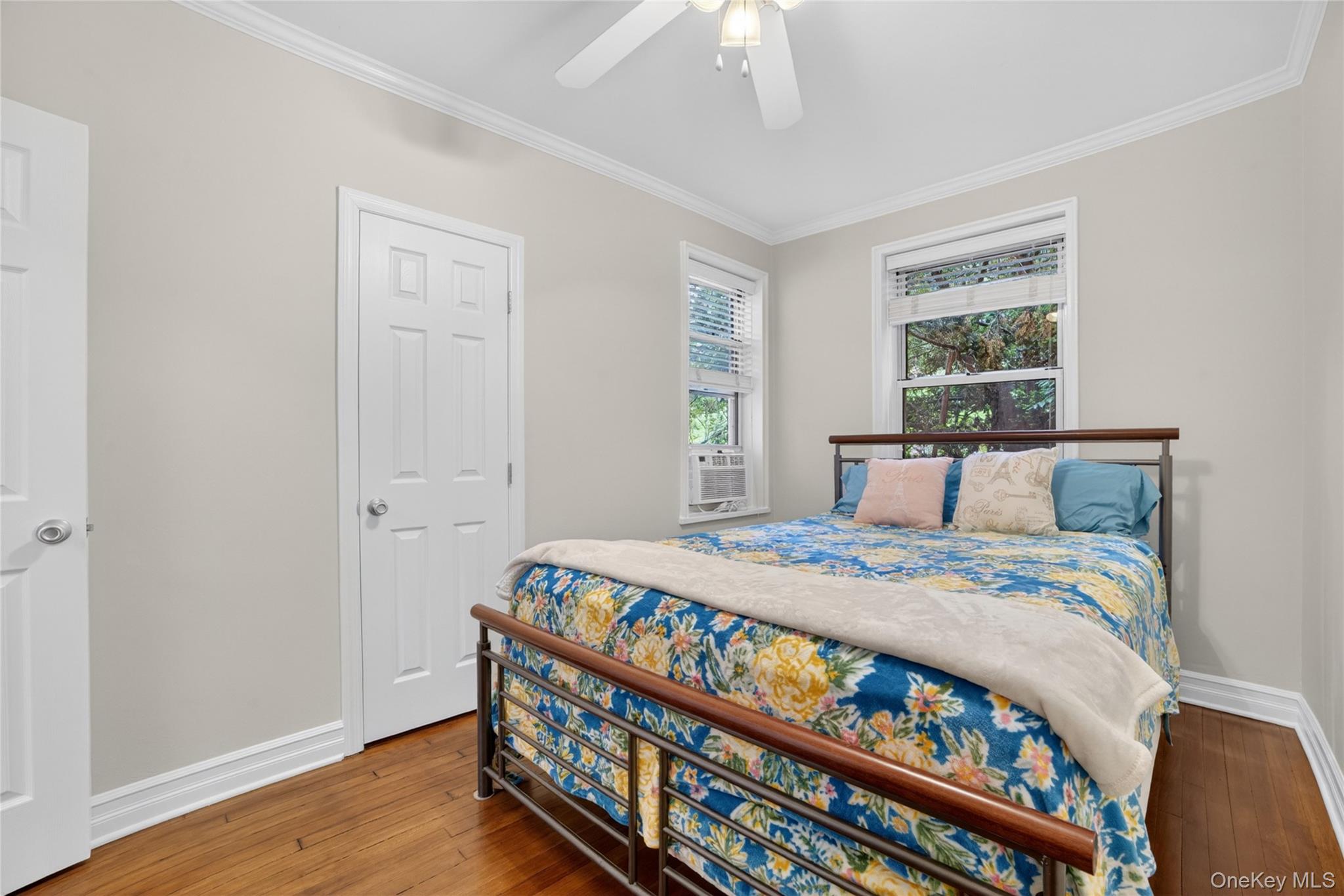 824 Palmer Road, Unit 1F Bronxville, NY 10708 - Photo 18 of 26 a bedroom with a bed and a window