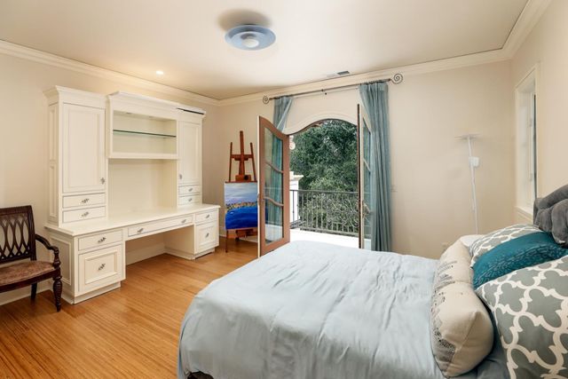 a bedroom with a bed and a cabinets