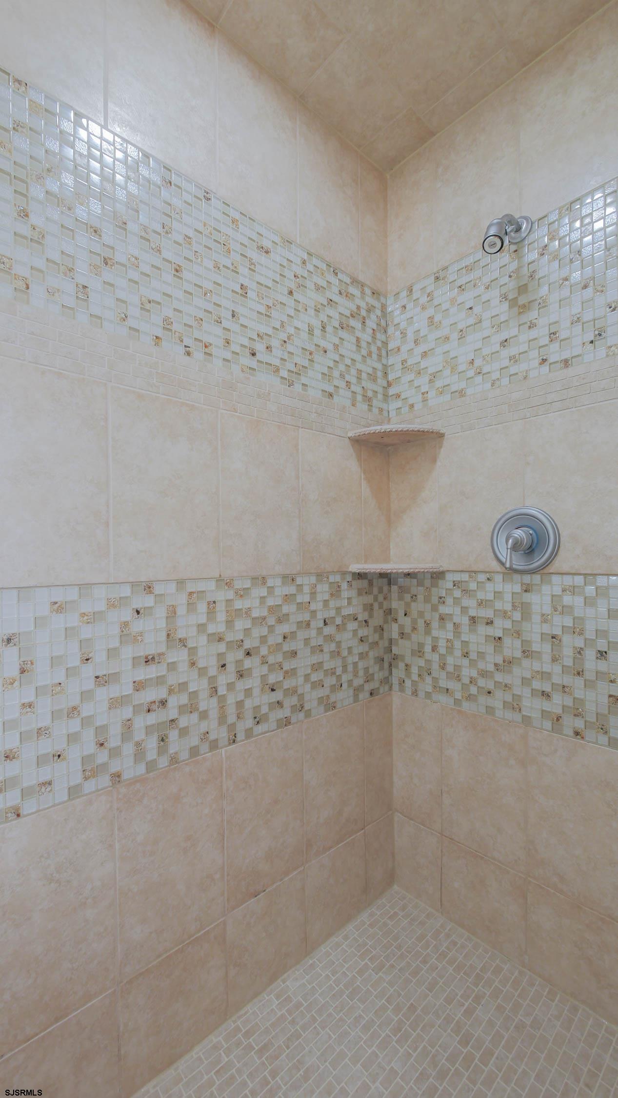 229 8th Street North Brigantine, NJ 08203 - Photo 26 of 42 a bathroom with a shower