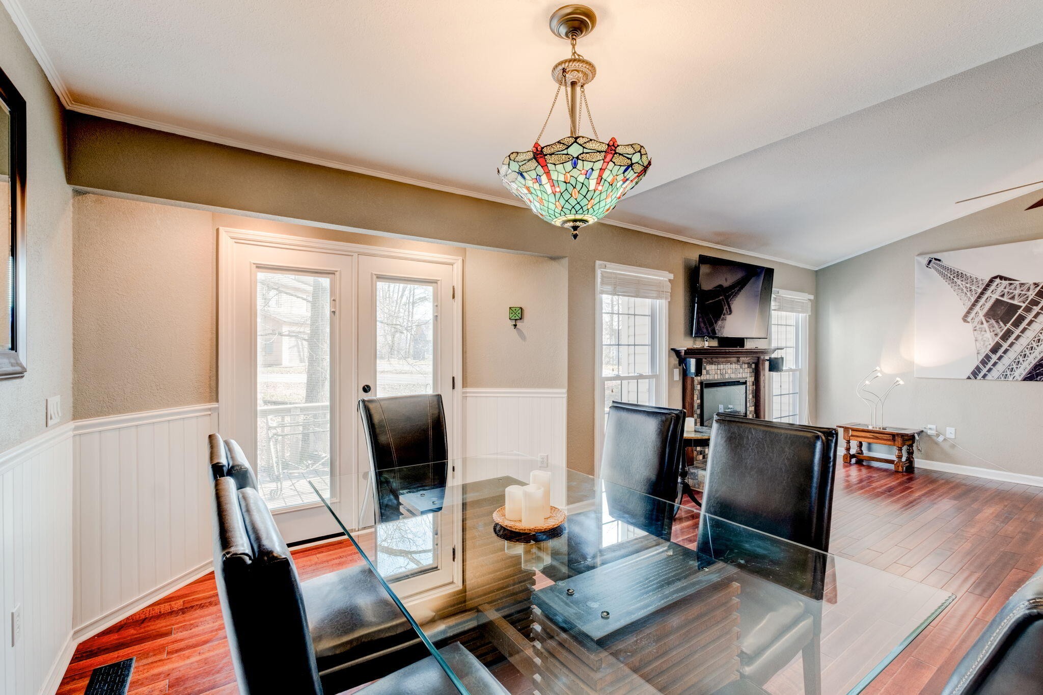 132 Pheasant Road Clinton, TN 37716 - Photo 11 of 40 a view of a dining room with furniture a chandelier and wooden floor