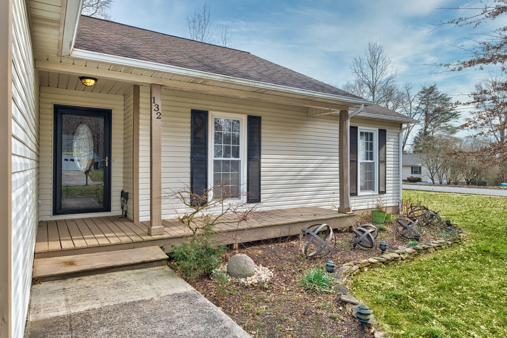 132 Pheasant Road Clinton, TN 37716 - Photo 2 of 40 a front view of a house with garden