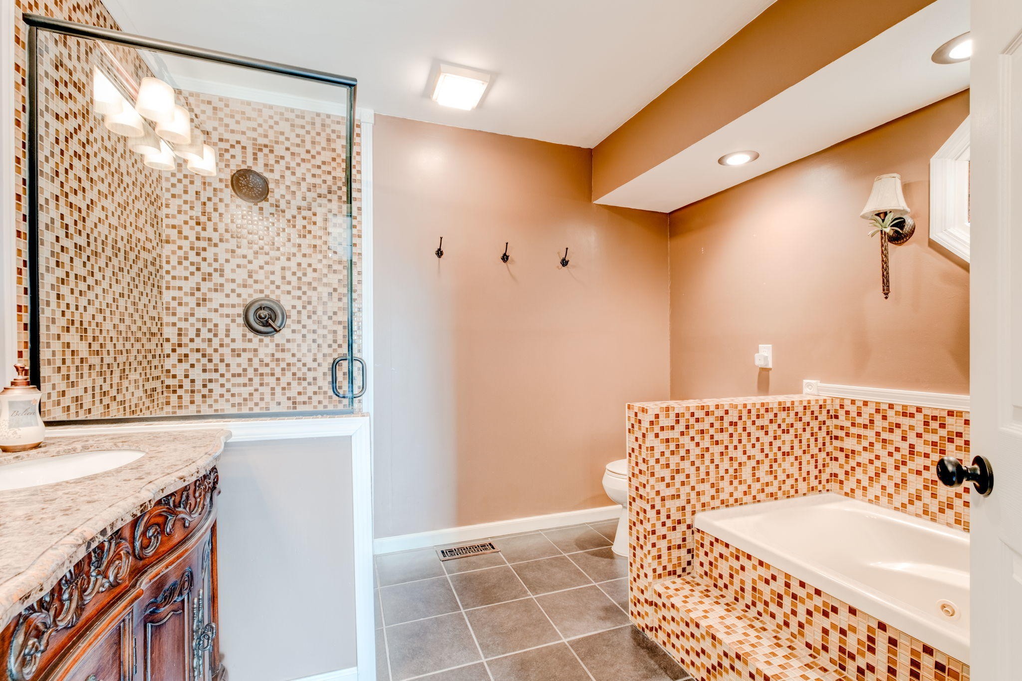 132 Pheasant Road Clinton, TN 37716 - Photo 35 of 40 a bathroom with a bathtub and a shower