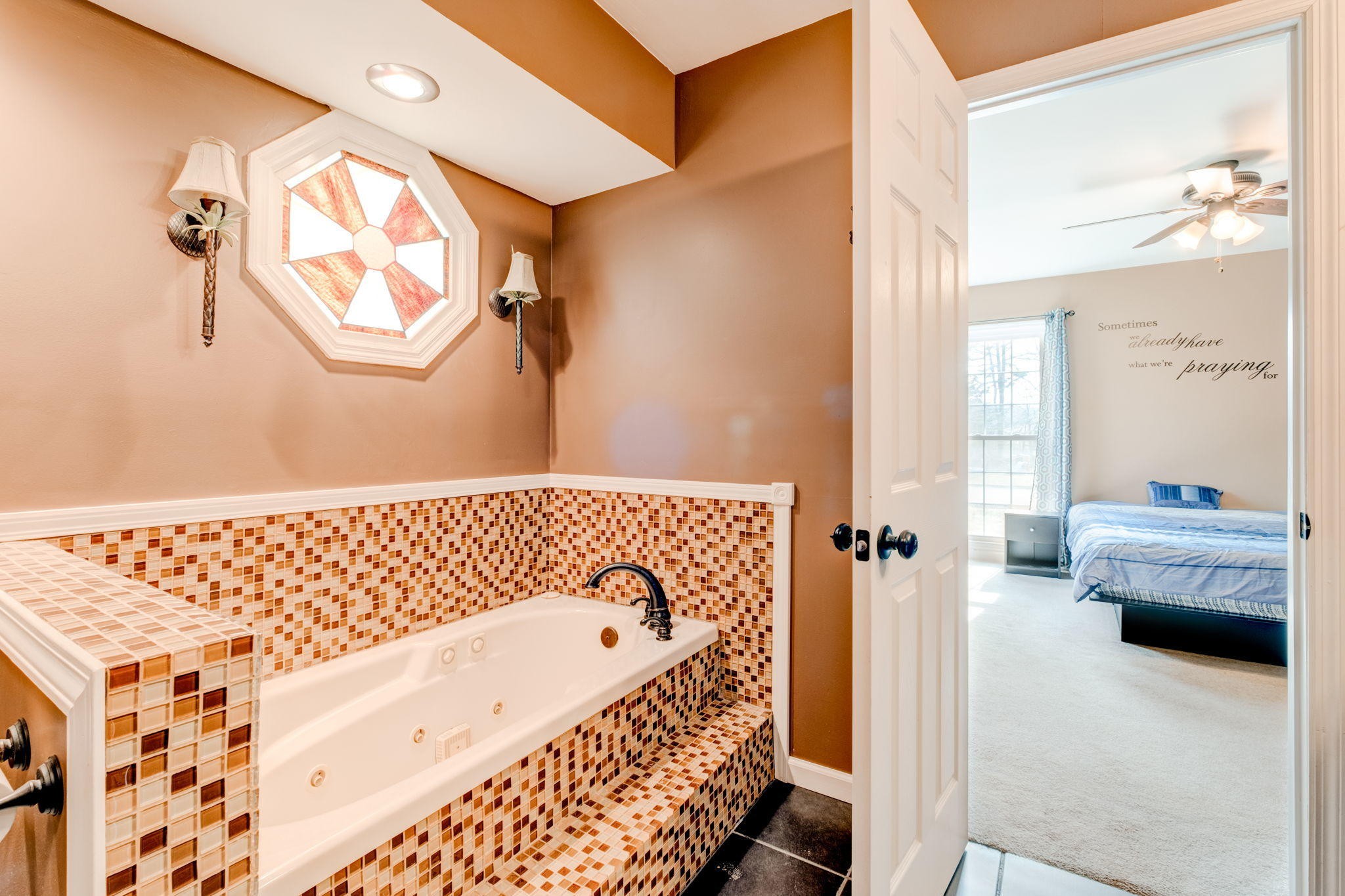 132 Pheasant Road Clinton, TN 37716 - Photo 36 of 40 a bedroom with a bed and wooden floor