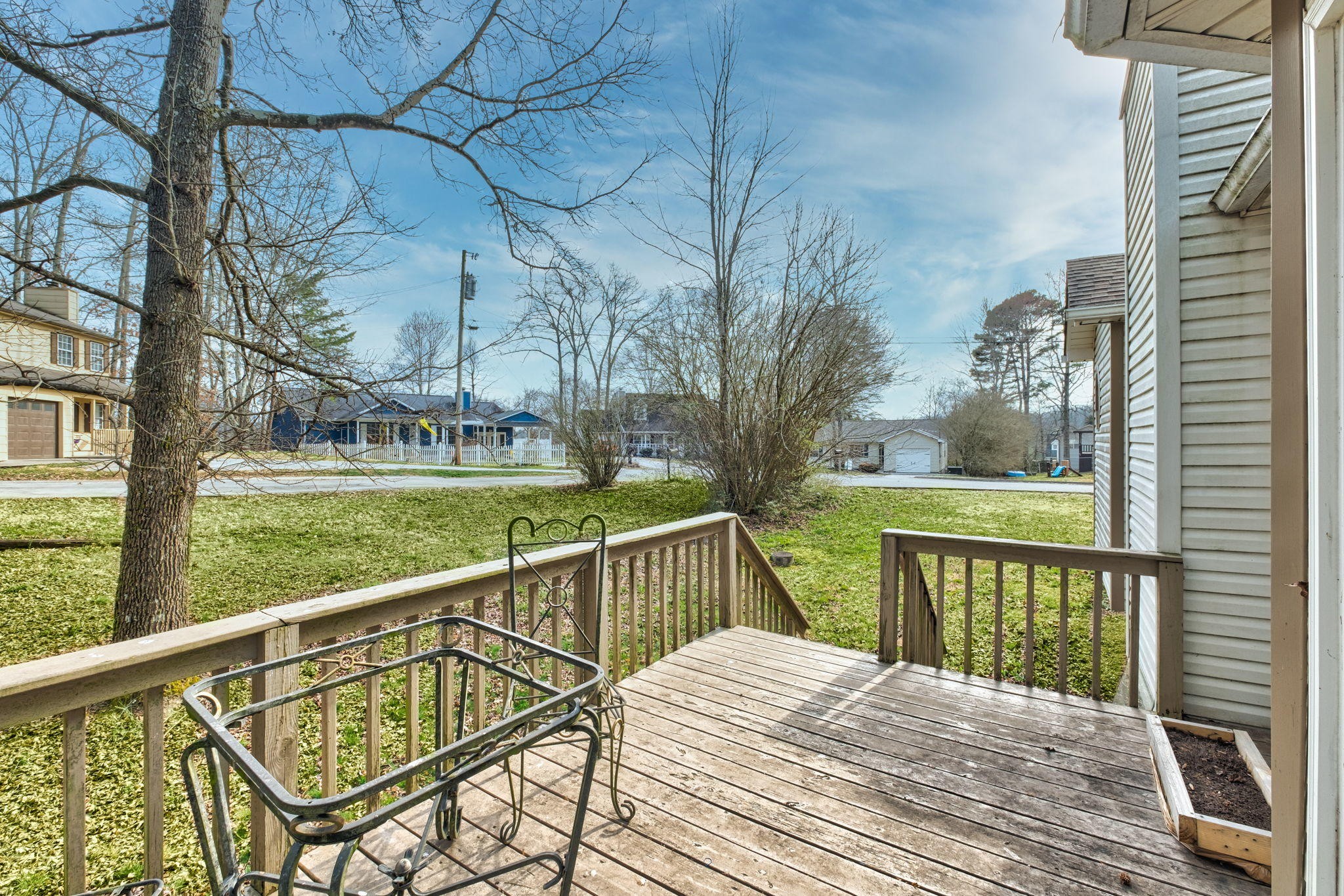 132 Pheasant Road Clinton, TN 37716 - Photo 39 of 40 a view of a balcony with wooden floor and fence