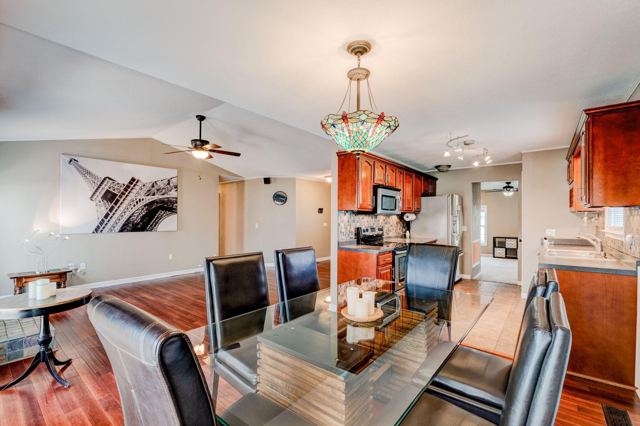 132 Pheasant Road Clinton, TN 37716 - Photo 10 of 40 a living room with furniture kitchen view and a chandelier
