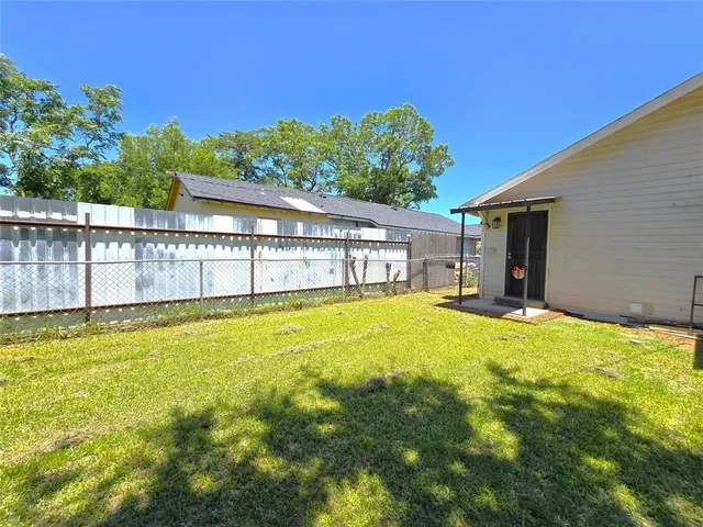 a view of a swimming pool with an outdoor space