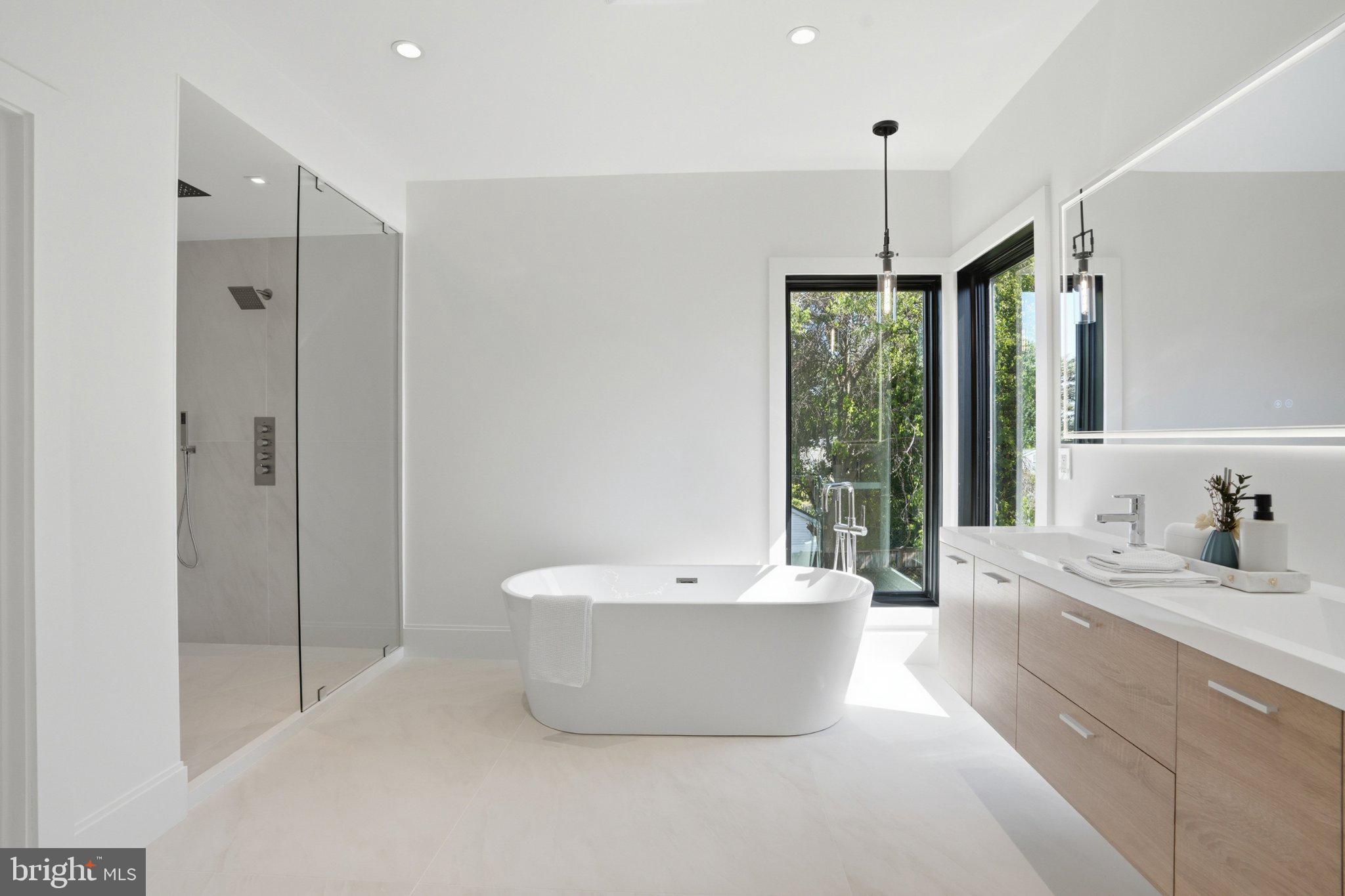 7421 Magarity Road Falls Church, VA 22043 - Photo 51 of 66 Sleek modern bathroom oasis.