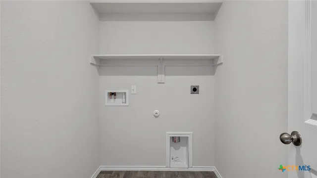 a view of small space with racks on the wall