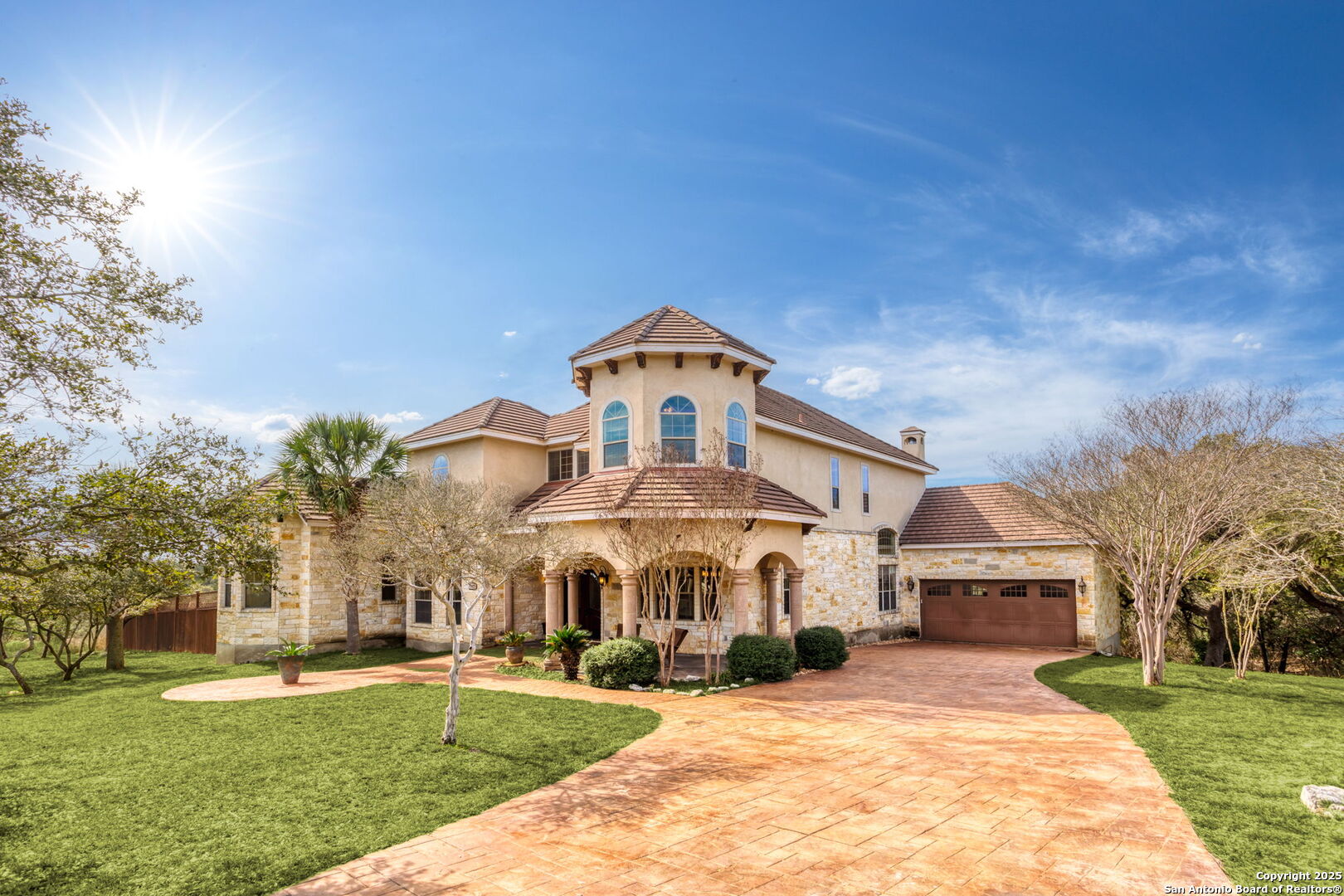 192 County Road 2812 Mico, TX 78056 - Photo 1 of 47 a front view of a house with a yard