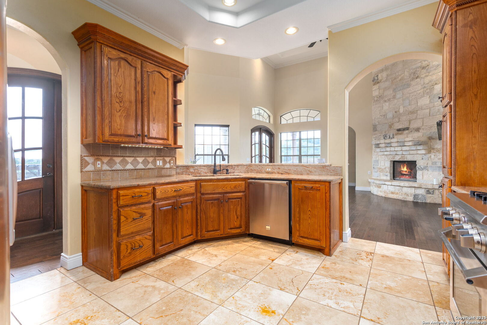 192 County Road 2812 Mico, TX 78056 - Photo 14 of 47 a large bathroom with a granite countertop double vanity sink a mirror and a bathtub