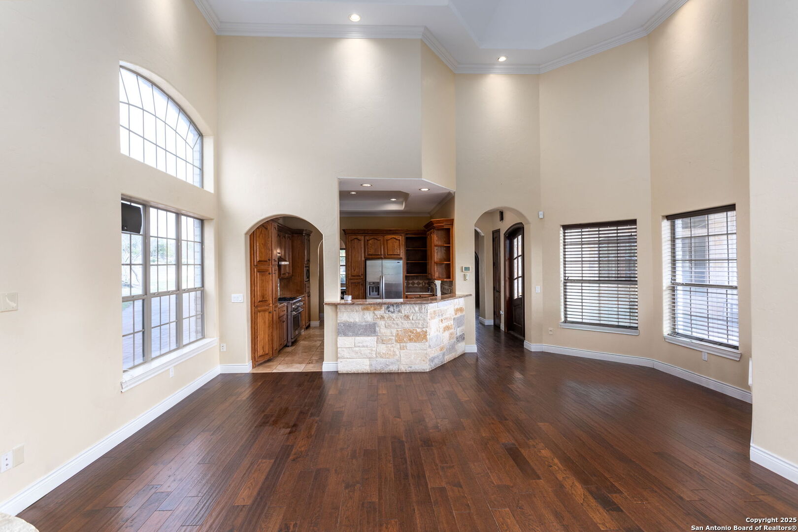 192 County Road 2812 Mico, TX 78056 - Photo 17 of 47 a view of a living room and entryway with wooden floor