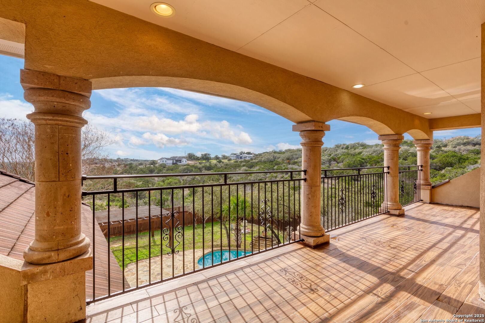 192 County Road 2812 Mico, TX 78056 - Photo 30 of 47 a view of balcony with staircase