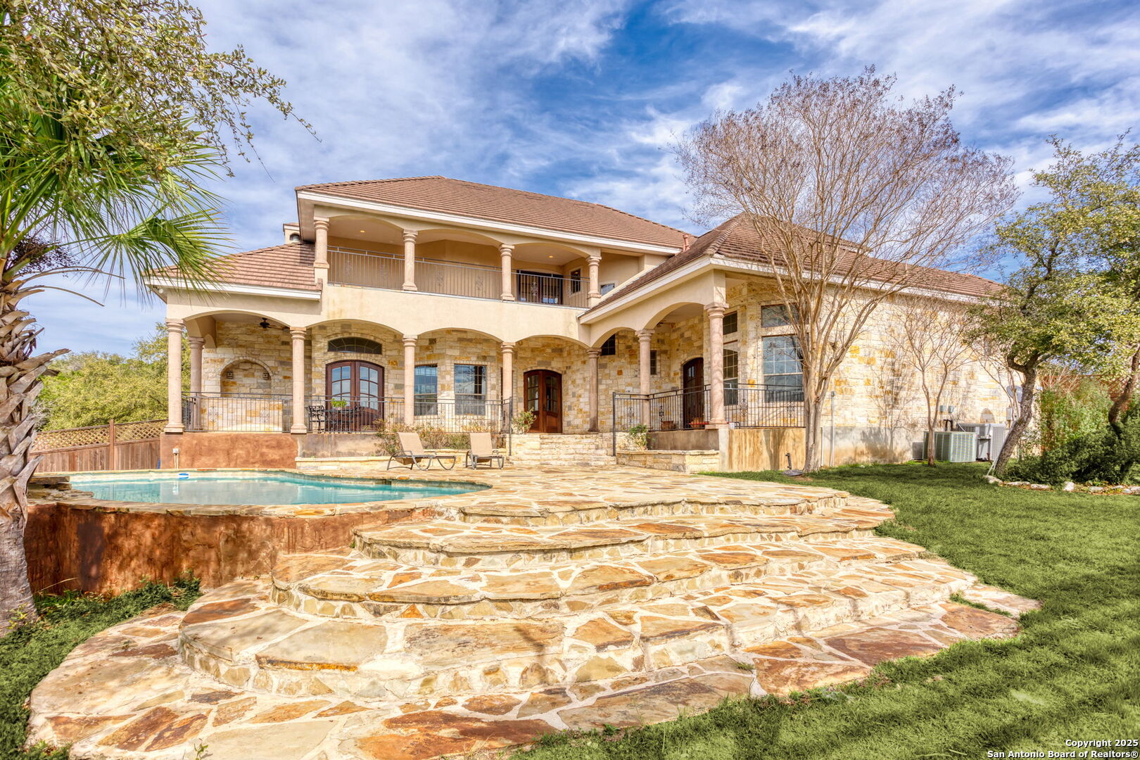 192 County Road 2812 Mico, TX 78056 - Photo 33 of 47 a view of a white house with a yard